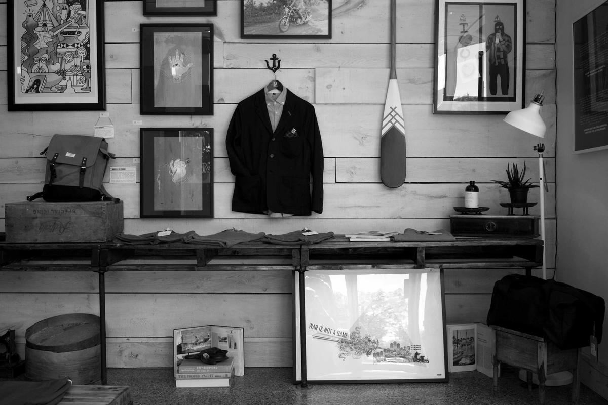A quiet room hung with framed pictures and keepsakes