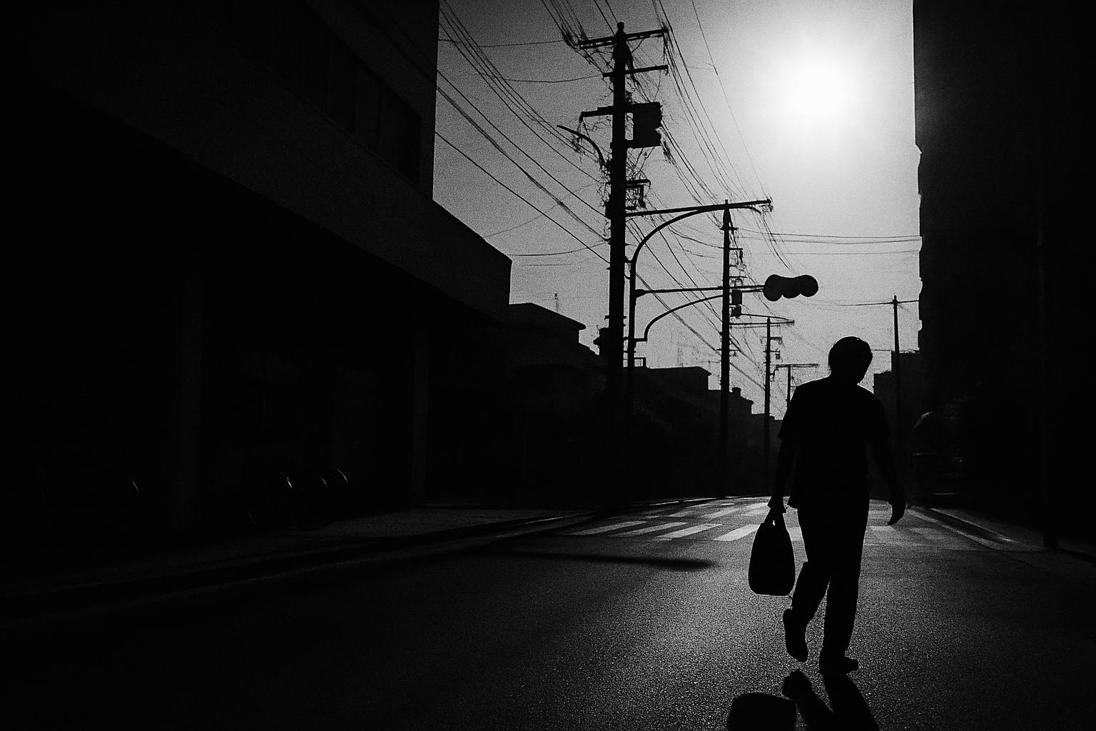 Grayscale editorial illustration: Japan's First Cruelly Hot Day Tests Work, School, And Power