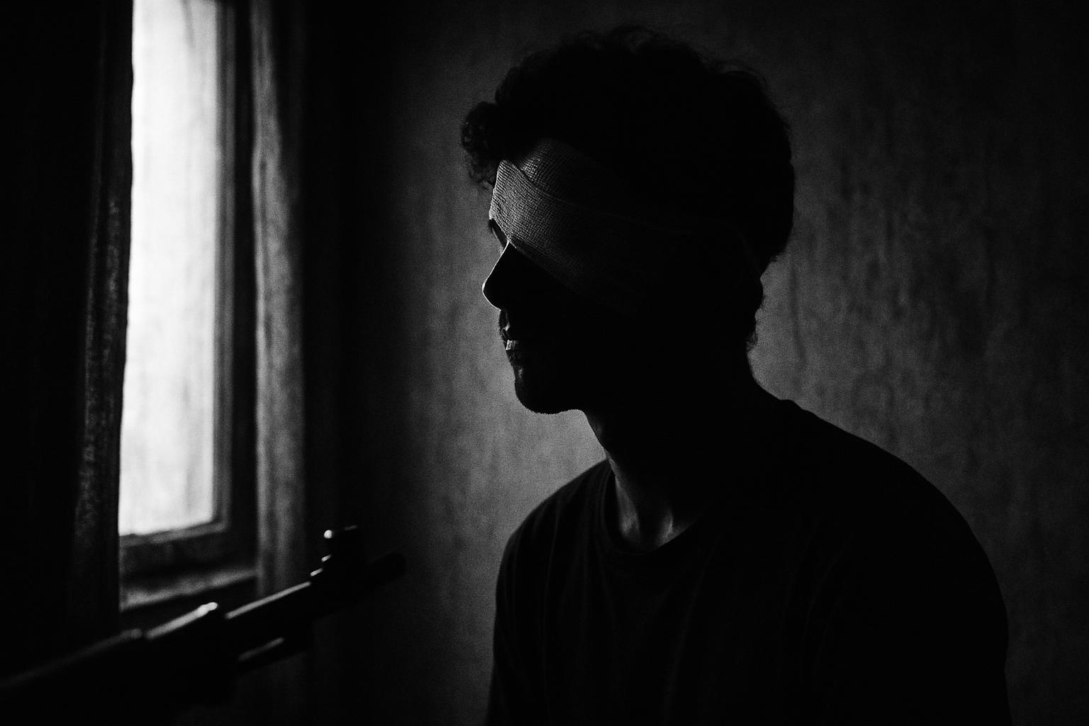 Grayscale editorial illustration: Pellet Guns In Exceptional Use, Says Supreme Court, As Srinagar Study Maps Psychological Toll
